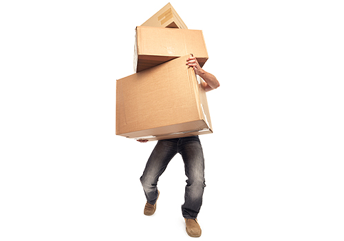 Photo: man carrying moving boxes