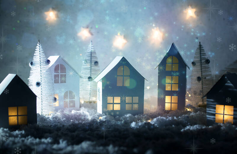 Christmas decorations with small, lit houses